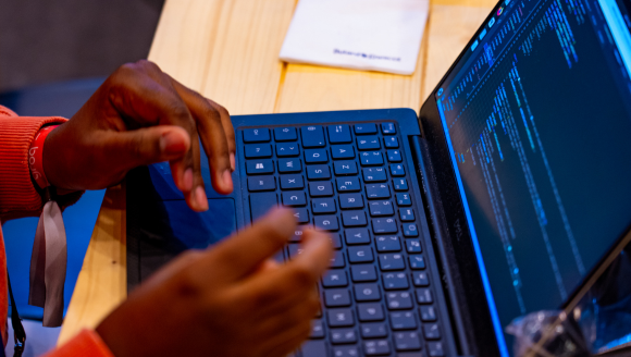 developer using laptop to study